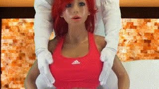 Bella jiggling in a sports bra