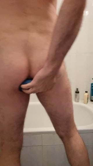 Fisting with a double ended dildo inside. Training to have someone jerk off inside me
