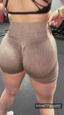 Shaking her wide butt