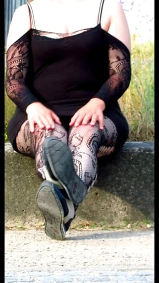 Public pussy posing in the park.
