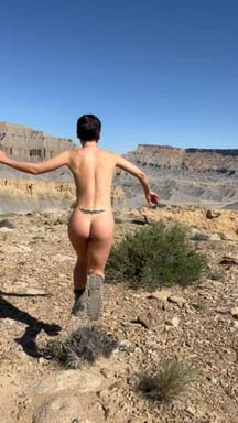 Naked enthusiastic hiking